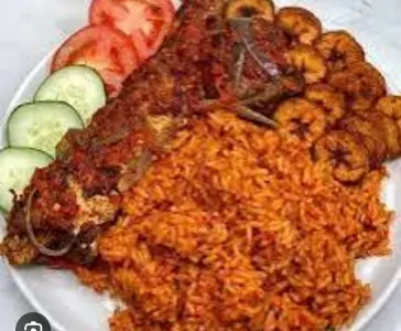 Jellof rice ,plantain ,Coslow with Fish
